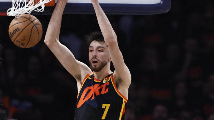 May 15, 2024; Oklahoma City, Oklahoma, USA; Oklahoma City Thunder forward Chet Holmgren (7) dunks against the Dallas Mavericks during the second half of game five of the second round for the 2024 NBA playoffs at Paycom Center. Mandatory Credit: Alonzo Adams-USA TODAY Sports