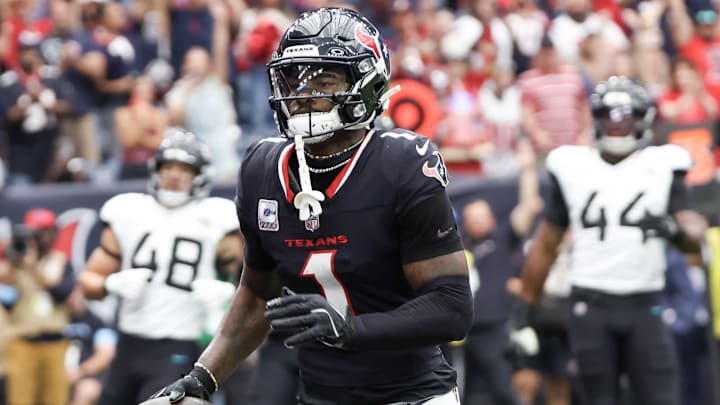Sep 29, 2024; Houston, Texas, USA; Houston Texans wide receiver Stefon Diggs (1) scores against the Jacksonville Jaguars in the first quarter at NRG Stadium. Mandatory Credit: Thomas Shea-Imagn Images Sep 29, 2024; Houston, Texas, USA; Houston Texans wide receiver Stefon Diggs (1) scores against the Jacksonville Jaguars in the first quarter at NRG Stadium. Mandatory Credit: Thomas Shea-Imagn Images