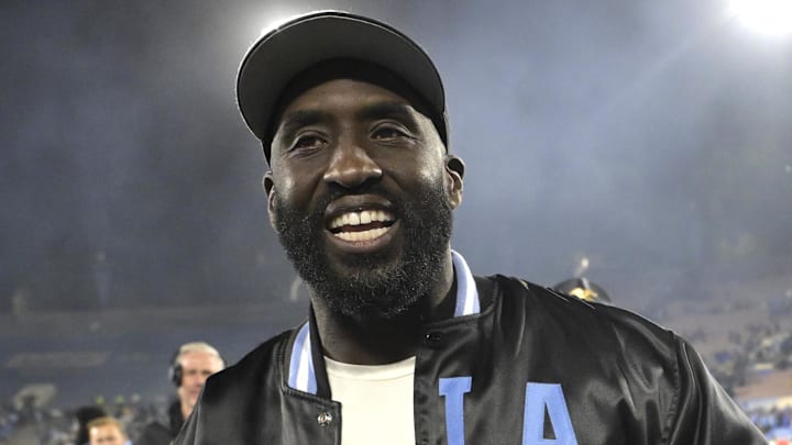 Nov 8, 2024; Pasadena, California, USA; UCLA Bruins head coach DeShaun Foster leaves the field with the game ball after defeating the Iowa Hawkeyes at the Rose Bowl. Mandatory Credit: Jayne Kamin-Oncea-Imagn Images Nov 8, 2024; Pasadena, California, USA; UCLA Bruins head coach DeShaun Foster leaves the field with the game ball after defeating the Iowa Hawkeyes at the Rose Bowl. Mandatory Credit: Jayne Kamin-Oncea-Imagn Images