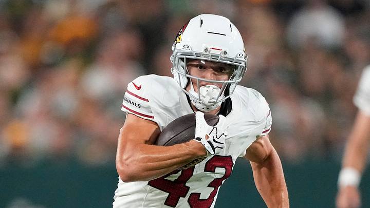 Aug 28, 2026; Green Bay, Wisconsin, USA;  Arizona Cardinals running back Evan Hull (43) rushes for a touchdown during the second quarter against the Green Bay Packers at Lambeau Field. Mandatory Credit: Jeff Hanisch-Imagn Images