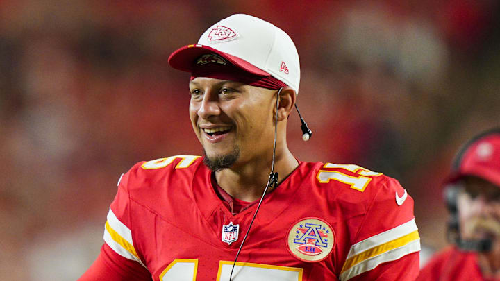 Aug 22, 2025; Kansas City, Missouri, USA; Kansas City Chiefs quarterback Patrick Mahomes (15) reacts after a touchdown during the second half against the Chicago Bears at GEHA Field at Arrowhead Stadium. Mandatory Credit: Jay Biggerstaff-Imagn Images