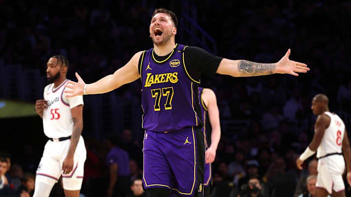 Feb 28, 2025; Los Angeles, California, USA; Los Angeles Lakers guard Luka Doncic (77) reacts after a play during the second quarter against the LA Clippers at Crypto.com Arena. Mandatory Credit: Jason Parkhurst-Imagn Images Feb 28, 2025; Los Angeles, California, USA; Los Angeles Lakers guard Luka Doncic (77) reacts after a play during the second quarter against the LA Clippers at Crypto.com Arena. Mandatory Credit: Jason Parkhurst-Imagn Images