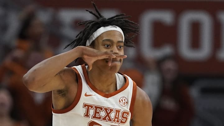 Jan 25, 2025; Austin, Texas, USA; Texas Longhorns guard Tre Johnson (20) reacts after scoring a three point basket during the second half against the Texas A&M Aggies at Moody Center. Mandatory Credit: Scott Wachter-Imagn Images