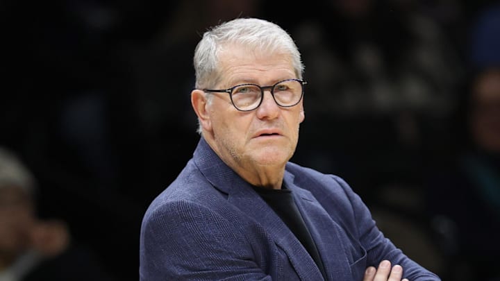 Dec 20, 2025; Brooklyn, New York, USA; UConn Huskies head coach Geno Auriemma stands on the court during the first half against the Iowa Hawkeyes at Barclays Center. Mandatory Credit: Pamela Smith-Imagn Images