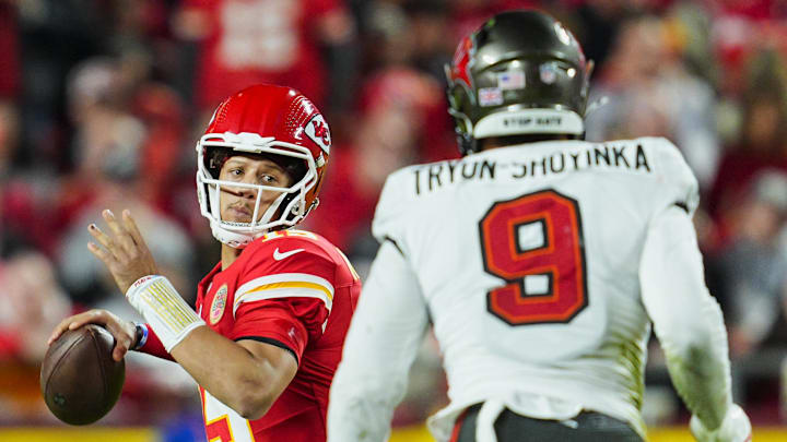 Kansas City Chiefs quarterback Patrick Mahomes throws a pass against Tampa Bay Buccaneers linebacker Joe Tryon-Shoyinka.