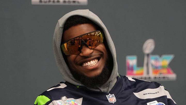Seattle Seahawks cornerback Devon Witherspoon talks to the media