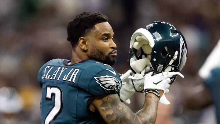 Philadelphia Eagles cornerback Darius Slay takes off his helmet.