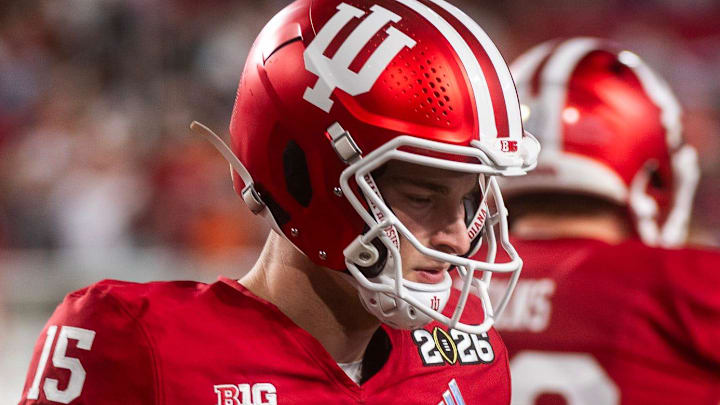Indiana's Fernando Mendoza (15) gets loose before the College Football Playoff National Championship college football game at Hard Rock Stadium in Miami Gardens on Monday, Jan. 19, 2026.