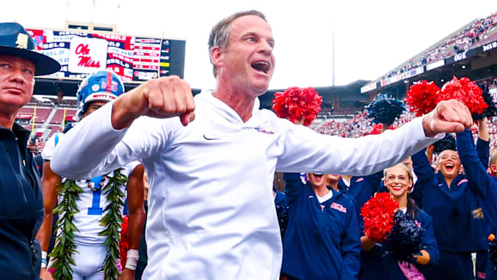 Oct 25, 2025; Norman, Oklahoma, USA;  Ole Miss Rebels head coach Lane Kiffin celebrates with fans after the game against the Oklahoma Sooners at Gaylord Family-Oklahoma Memorial Stadium. Mandatory Credit: Kevin Jairaj-Imagn Images
