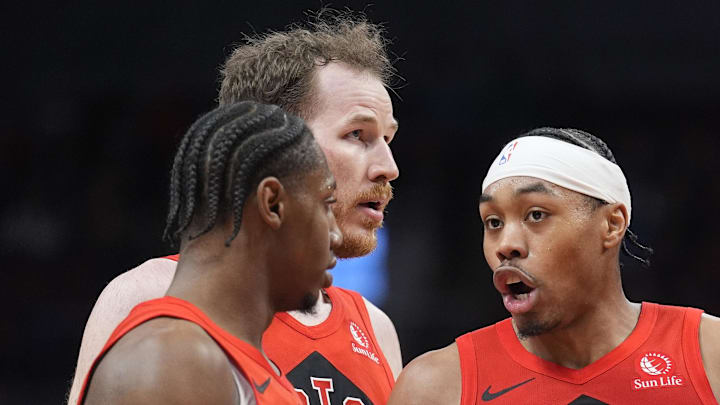 Toronto Raptors guard Scottie Barnes talks to forward RJ Barrett and center Jakob Poeltl and forward Brandon Ingram. Toronto Raptors guard Scottie Barnes talks to forward RJ Barrett and center Jakob Poeltl and forward Brandon Ingram.
