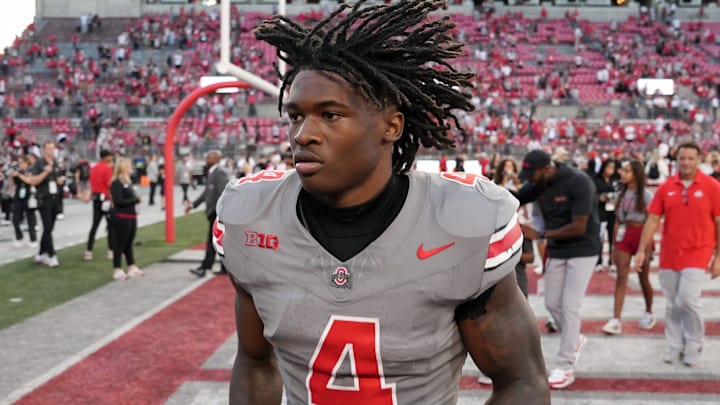 Oct 5, 2024; Columbus, OH, USA; Ohio State Buckeyes wide receiver Jeremiah Smith (4) runs off the field after beating Iowa Hawkeyes after the NCAA football game at Ohio Stadium.