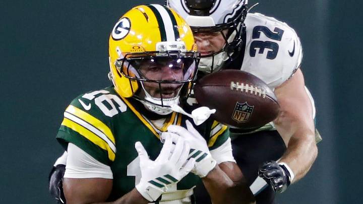 Green Bay Packers receiver Bo Melton (16) drops a pass against Philadelphia Eagles safety Reed Blankenship.