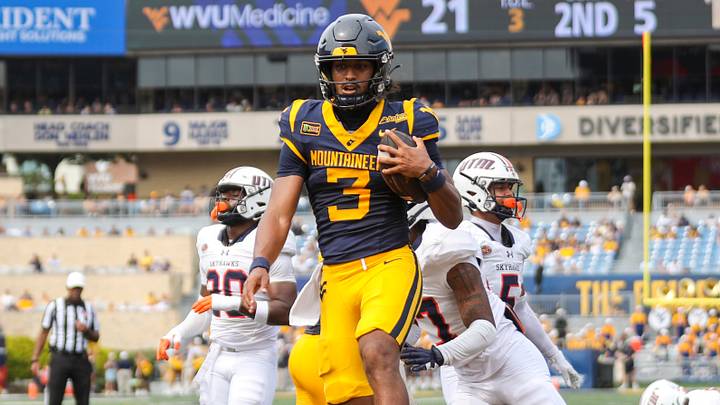 Sep 12, 2026; Morgantown, West Virginia, USA;  West Virginia Mountaineers quarterback Michael Hawkins Jr. (3) runs the ball for a touchdown during the second quarter against the UT Martin Skyhawks at Milan Puskar Stadium.  Mandatory Credit: Ben Queen-Imagn Images