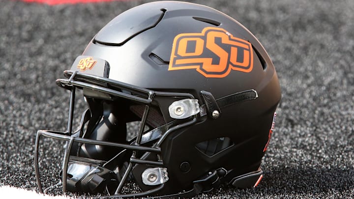 Oct 25, 2025; Lubbock, Texas, USA;  A general view of an Oklahoma State Cowboys helmet on the field before the game against the Texas Tech Red Raiders at Jones AT&T Stadium.
