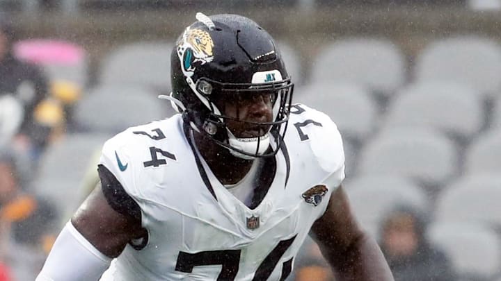 Oct 29, 2023; Pittsburgh, Pennsylvania, USA;  Jacksonville Jaguars offensive tackle Cam Robinson (74) at the line of scrimmage against the Pittsburgh Steelers during the second quarter at Acrisure Stadium. Mandatory Credit: Charles LeClaire-Imagn Images