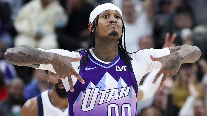Nov 14, 2024; Salt Lake City, Utah, USA; Utah Jazz guard Jordan Clarkson (00) reacts to making a three point shot against the Dallas Mavericks during the third quarter at Delta Center. Mandatory Credit: Rob Gray-Imagn Images