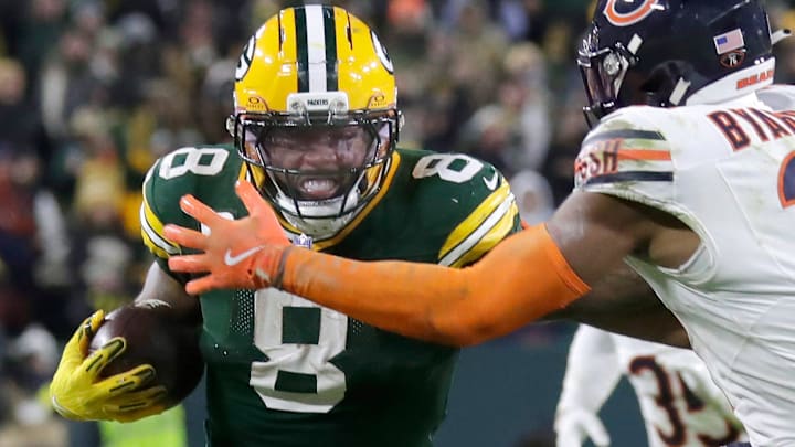 Green Bay Packers running back Josh Jacobs (8) against the Chicago Bears safety Kevin Byard III (31) on Sunday, December 7, 2025, at Lambeau Field in Green Bay, Wis. The Packers defeated the Bears 28-21. Green Bay Packers running back Josh Jacobs (8) against the Chicago Bears safety Kevin Byard III (31) on Sunday, December 7, 2025, at Lambeau Field in Green Bay, Wis. The Packers defeated the Bears 28-21.