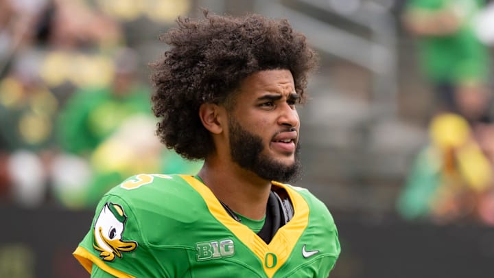 Oregon quarterback Dante Moore warms up as the Oregon Ducks host the Oklahoma State Cowboys on Sept. 6, 2025, at Autzen Stadium in Eugene, Oregon. Oregon quarterback Dante Moore warms up as the Oregon Ducks host the Oklahoma State Cowboys on Sept. 6, 2025, at Autzen Stadium in Eugene, Oregon.