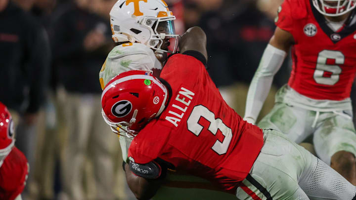 Nov 16, 2024; Athens, Georgia, USA; Tennessee Volunteers running back Dylan Sampson (6) is tackled by Georgia Bulldogs linebacker CJ Allen (3) in the third quarter at Sanford Stadium. Mandatory Credit: Brett Davis-Imagn Images