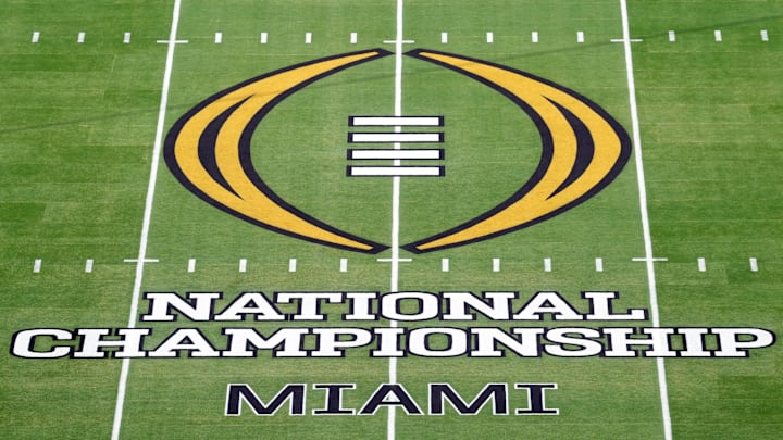 Jan 19, 2026; Miami Gardens, FL, USA; The CFP National Championship college football game logo at midfield at Hard Rock Stadium. Mandatory Credit: Kirby Lee-Imagn Images