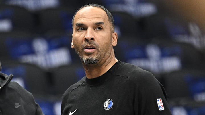 Oct 7, 2024; Dallas, Texas, USA; Dallas Mavericks general manager Nico Harrison (right) looks on during warms up before the game between the Dallas Mavericks and the Memphis Grizzlies at the American Airlines Center. Mandatory Credit: Jerome Miron-Imagn Images