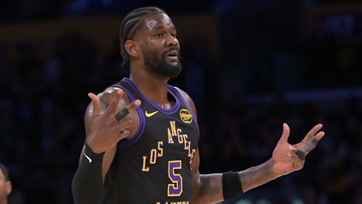 Apr 21, 2026; Los Angeles, California, USA; Los Angeles Lakers center Deandre Ayton (5) reacts on the court after a three-point basket by guard Marcus Smart (36) in the first half of game two of the first round of the 2026 NBA Playoffs against the Houston Rockets at Crypto.com Arena. Mandatory Credit: Jayne Kamin-Oncea-Imagn Images