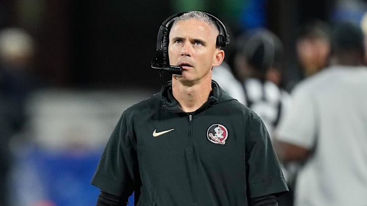 Dec 2, 2023; Charlotte, NC, USA; Florida State Seminoles head coach Mike Norvell walks the sidelines during the third quarter against the Louisville Cardinals at Bank of America Stadium. Mandatory Credit: Jim Dedmon-Imagn Images Dec 2, 2023; Charlotte, NC, USA; Florida State Seminoles head coach Mike Norvell walks the sidelines during the third quarter against the Louisville Cardinals at Bank of America Stadium. Mandatory Credit: Jim Dedmon-Imagn Images