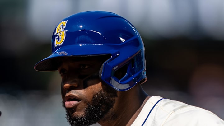 Seattle Mariners right fielder Victor Robles (10) celebrates at second base after hitting a two-run single during the third inning against the Athletics at T-Mobile Park on Aug. 24. 