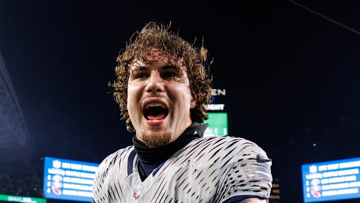 AJ Barner of the Seattle Seahawks celebrates