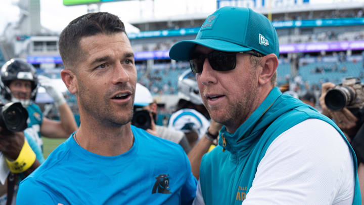 Carolina Panthers head coach Dave Canales and Carolina Panthers head coach Liam Coen met at the center of the field after the game between the Carolina Panthers at Jacksonville Jaguars at EverBank Stadium Sunday September 7, 2025. Jaguars defeated the Panthers 26-10. [Doug Engle/Florida Times-Union]