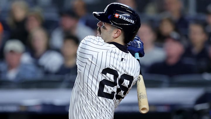 Oct 29, 2024; New York, New York, USA; New York Yankees catcher Austin Wells (28) hits a home run during the sixth inning against the Los Angeles Dodgers in game four of the 2024 MLB World Series at Yankee Stadium