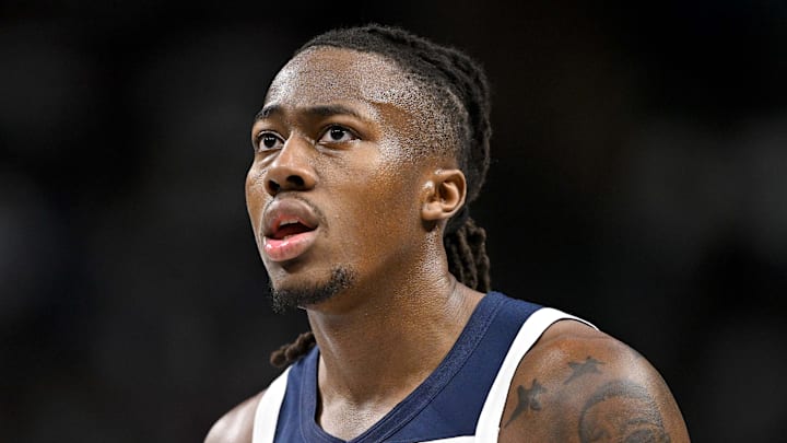 Mar 30, 2026; Dallas, Texas, USA; Minnesota Timberwolves guard Ayo Dosunmu (13) looks on during the second half against the Dallas Mavericks at the American Airlines Center. Mandatory Credit: Jerome Miron-Imagn Images