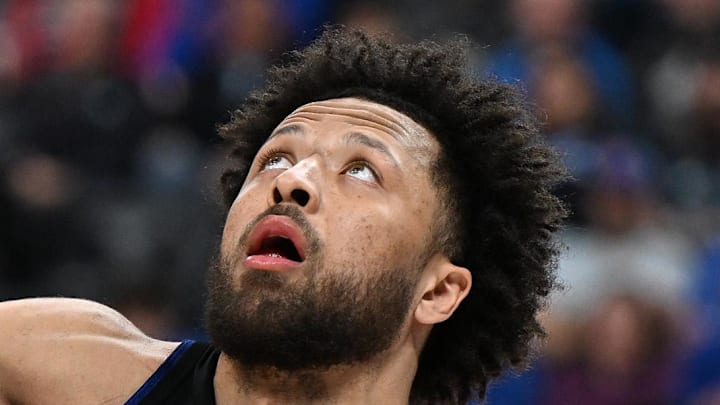 Feb 27, 2026; Detroit, Michigan, USA;   Cleveland Cavaliers guard Jaylon Tyson (20) battles for position with Detroit Pistons guard Cade Cunningham (2) : Lon Horwedel-Imagn Images