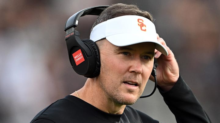 Sep 13, 2025; West Lafayette, Indiana, USA; Southern California Trojans head coach Lincoln Riley stands on the sidelines during the first quarter against the Purdue Boilermakers at Ross-Ade Stadium. Mandatory Credit: Marc Lebryk-Imagn Images