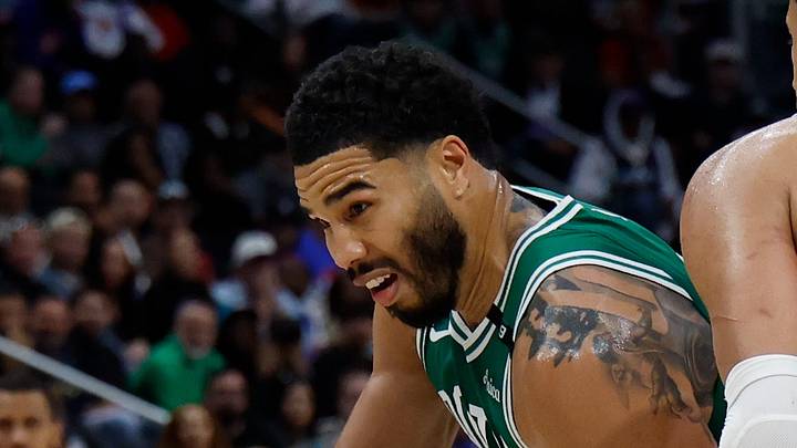 Oct 20, 2026; Detroit, Michigan, USA;  Boston Celtics forward-guard Jayson Tatum (0) dribbles defended by Detroit Pistons guard Cade Cunningham (2) in the second half at Little Caesars Arena.  Mandatory Credit: Rick Osentoski-Imagn Images