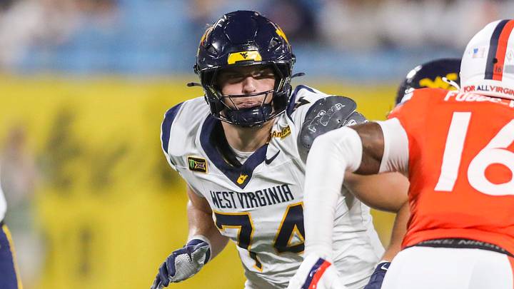 Sep 19, 2026; Charlotte, North Carolina, USA; West Virginia Mountaineers offensive lineman Kevin Brown (74) drops back to block during the first quarter against the Virginia Cavaliers at Bank of America Stadium. Mandatory Credit: Ben Queen-Imagn Images