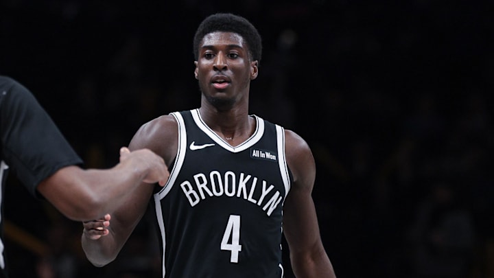 Apr 5, 2026; Brooklyn, New York, USA; Brooklyn Nets guard Drake Powell (4) celebrates with forward E.J. Liddell (9) after defeafting the Washington Wizards at Barclays Center. Mandatory Credit: Vincent Carchietta-Imagn Images