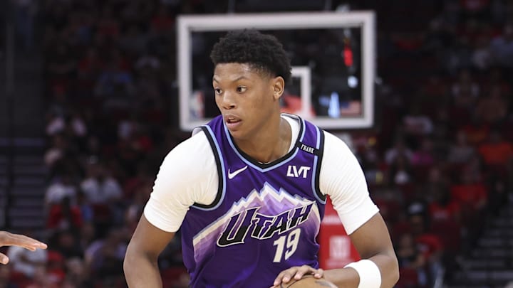 Oct 8, 2025; Houston, Texas, USA; /Utah Jazz forward Ace Bailey (19) dribbles the ball as Houston Rockets forward Jabari Smith Jr. (10) defends during the second quarter at Toyota Center. Mandatory Credit: Troy Taormina-Imagn Images Oct 8, 2025; Houston, Texas, USA; /Utah Jazz forward Ace Bailey (19) dribbles the ball as Houston Rockets forward Jabari Smith Jr. (10) defends during the second quarter at Toyota Center. Mandatory Credit: Troy Taormina-Imagn Images