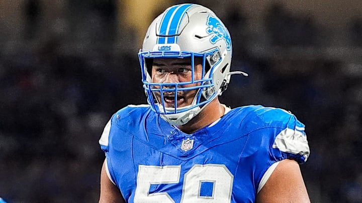 Detroit Lions offensive tackle Giovanni Manu (59) gets into position before a play against the Pittsburgh Steelers during the first half of a preseason game at Ford Field in Detroit on Saturday, August 24, 2024.