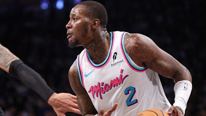Feb 7, 2025; Brooklyn, New York, USA; Miami Heat guard Terry Rozier (2) is guarded by Brooklyn Nets forward Trendon Watford (9) during the second half at Barclays Center. Mandatory Credit: Vincent Carchietta-Imagn Images