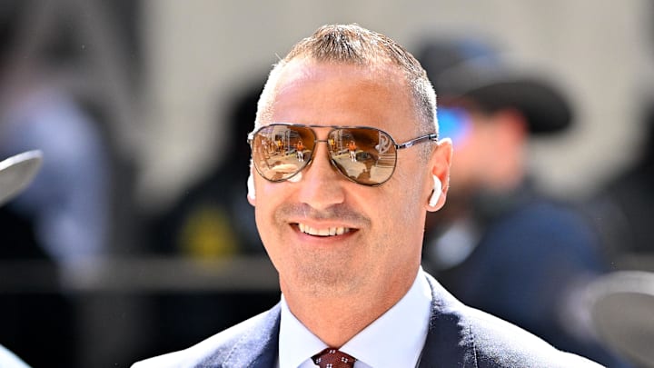 Texas Longhorns head coach Steve Sarkisian arrives at the stadium before the game between the Texas Longhorns and the Oklahoma Sooners at the Cotton Bowl. 