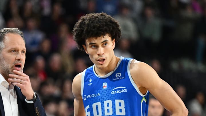 Feb 15, 2025 Caen, FRANCE; St Quentin point guard Nolan Traore with coach Julien Mahe against Le Mans in a Leaders Cup match. Mandatory Credit: Franck Faugere/Presse Sports via Imagn Images