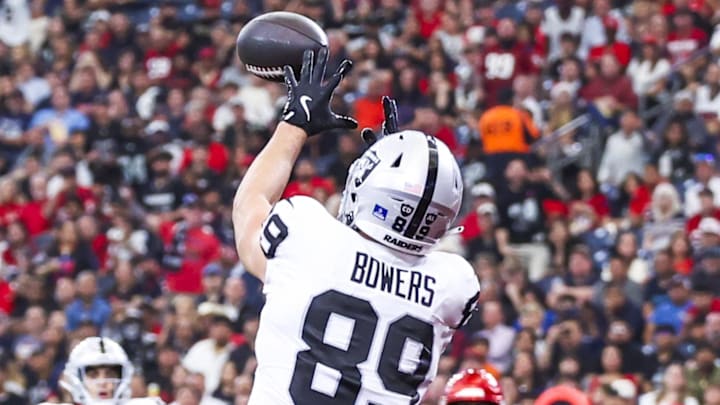 Dec 21, 2025; Houston, Texas, USA; Las Vegas Raiders tight end Brock Bowers (89) catches a touchdown pass against the Houston Texans during the second quarter at NRG Stadium. Mandatory Credit: Troy Taormina-Imagn Images