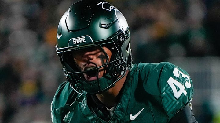 Oct 25, 2025; East Lansing, Michigan, USA; Michigan State Spartans safety Malik Spencer (43) reacts after a third down defensive play against the Michigan Wolverines during the first half at Spartan Stadium. Mandatory Credit: Brendan Mullin-Imagn Images