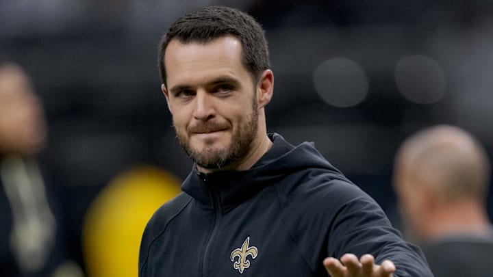 Dec 29, 2024; New Orleans, Louisiana, USA; New Orleans Saints quarterback Derek Carr (4) walks the field before a game against the Las Vegas Raiders at Caesars Superdome. Mandatory Credit: Matthew Hinton-Imagn Images