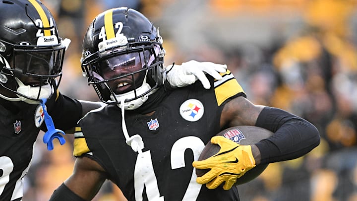 Nov 16, 2025; Pittsburgh, Pennsylvania, USA; Pittsburgh Steelers cornerback James Pierre (42) celebrates with cornerback Joey Porter Jr. (24) after scoring a touchdown against the Cincinnati Bengals during the fourth quarter at Acrisure Stadium. Mandatory Credit: Barry Reeger-Imagn Images