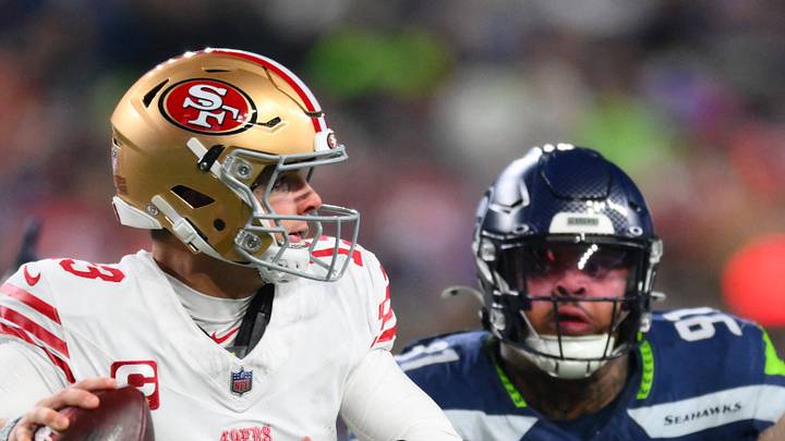 San Francisco 49ers quarterback Brock Purdy is pressured by Seattle Seahawks defensive tackle Byron Murphy II San Francisco 49ers quarterback Brock Purdy is pressured by Seattle Seahawks defensive tackle Byron Murphy II