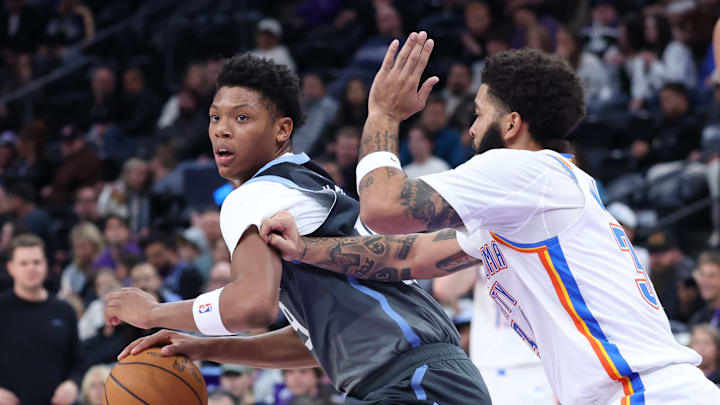 Dec 7, 2025; Salt Lake City, Utah, USA; Utah Jazz guard Ace Bailey (19) looks for the play as Oklahoma City Thunder guard Kenrich Williams (34) defends during the second half at Delta Center. Mandatory Credit: Rob Gray-Imagn Images Dec 7, 2025; Salt Lake City, Utah, USA; Utah Jazz guard Ace Bailey (19) looks for the play as Oklahoma City Thunder guard Kenrich Williams (34) defends during the second half at Delta Center. Mandatory Credit: Rob Gray-Imagn Images
