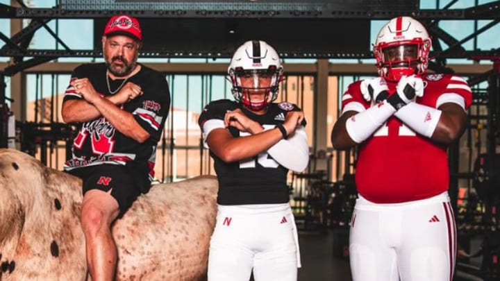 Nebraska football coach Matt Rhule with 2026 commits Dayton Raiola (middle) and Claude Mpouma (right).