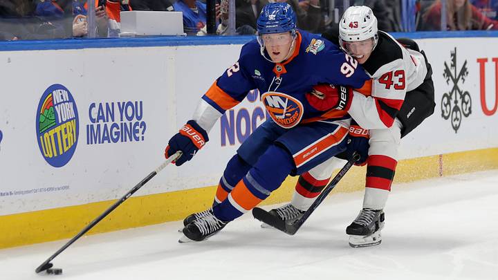 Oct 3, 2026; Elmont, New York, USA; New York Islanders right wing Simon Holmstrom (92) skates with the puck against New Jersey Devils defenseman Luke Hughes (43) during the third period at UBS Arena. Mandatory Credit: Brad Penner-Imagn Images Oct 3, 2026; Elmont, New York, USA; New York Islanders right wing Simon Holmstrom (92) skates with the puck against New Jersey Devils defenseman Luke Hughes (43) during the third period at UBS Arena. Mandatory Credit: Brad Penner-Imagn Images